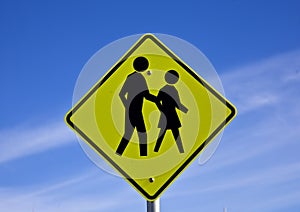 Road sign people crossing