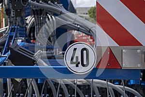 Road sign on a plow trailer speed limit to 20 km per hour