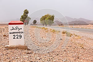 Road sign on the road to Marrakesh in Morocco