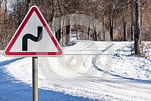 Road sign on a snow-covered road