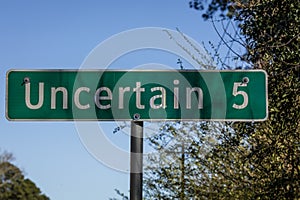 Road sign to Uncertain. Highway, Design