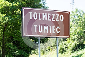 Road sign of Tolmezzo, Italy