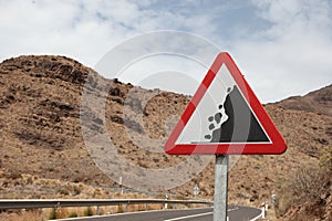 Road sign warning of falling rocks in spain