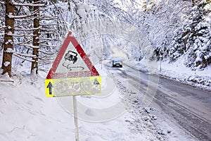 Road sign warns of ice and snow