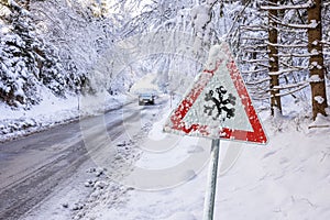 Road sign warns of ice and snow