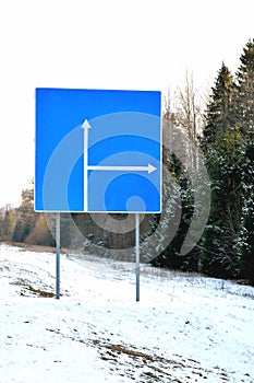 Road sign on winter road,  copy space