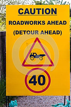 Road Sign Words Caution Trucks