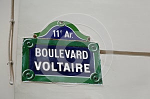 Road sign with written Boulevard Voltaire in Paris