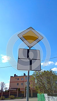 Road signs and a blue-blue sky