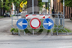 Road signs. Deviation on the route, signaling of an obstacle and deflection arrows to avoid it.