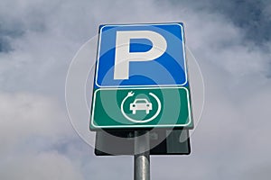 Road signs for electric vehicle charging. sign with parking symbol and electric cable, for a space reserved for electric cars.