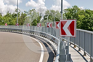 Road signs, indicating left turn