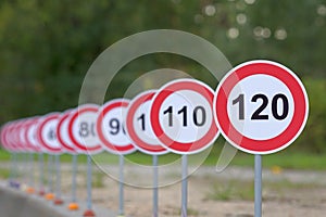 A road signs indicating from 110 to 120 as the speed limit