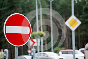 Road signs and lines on asphalt