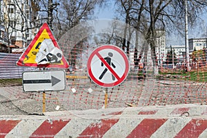 Road signs prohibiting the passage of pedestrians in the territory where repairs are being carried out