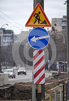 Road signs, road work ahead, warning signs on the city streets