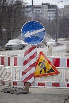 Road signs, road work ahead, warning signs on the city streets