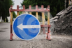 Road signs. Road works. Road warning signs. City streets. Road sign indicating direction