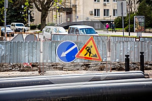 Road signs! Road works with trucks and traffic signs. road blocked signs and traffic is prohibited