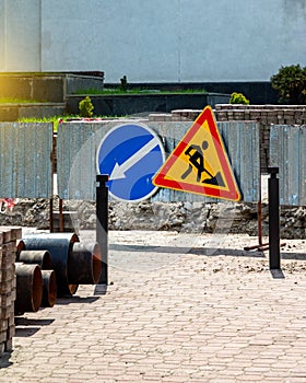 Road signs! Road works with trucks and traffic signs. road blocked signs and traffic is prohibited