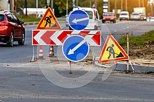 Road signs!Road works with trucks and traffic signs.road works road blocked signs and traffic cones diversion access only;Barriers