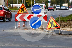 Road signs!Road works with trucks and traffic signs.road works road blocked signs and traffic cones diversion access onlyBarriers