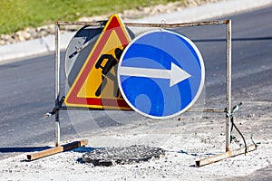 Road signs!Road works with trucks and traffic signs.road works road blocked signs and traffic cones diversion access onlyBarriers