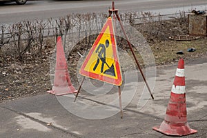 Road signs in a street under reconstruction