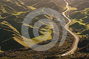 Road snaking amongst volcanic hills in Rotorua photo