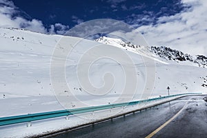 Road in the snow capped mountains