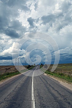 Road and the storm sky