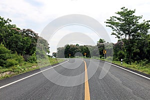Road, street, avenue roadway, countryside road and curve traffic signs in the left Thailand