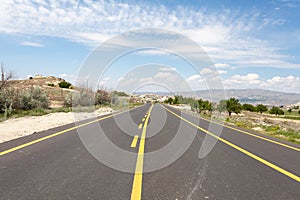 Road in summer mountains valley Cappadocia Turkey.