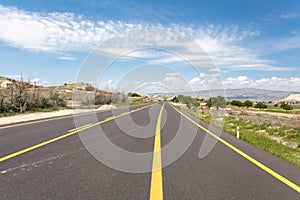 Road in summer mountains valley Cappadocia Turkey.