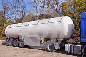 Road tanker with thermal insulation designed for the carriage flammable substances. Truck with a specialist semi-trailer