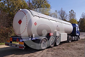 Road tanker with thermal insulation designed for the carriage flammable substances. Truck with a specialist semi-trailer