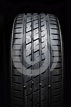On-road tire tread isolated on black background