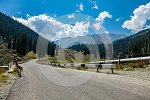 Road to the Big Almaty Lake. Hills in the Zailiyskiy Alatau Mountains, Tien Shan mountain system in Kazakhstan..Big Almaty Gorge
