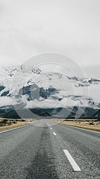 The road to Mount Cook New Zealand. Landscape snowy Alpine mountains.