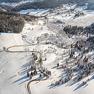 Road to mountains covered with snow