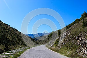 The road to the mountains. Mountains in the background. The road to the mountain Bjelasnica in Bosnia and Herzegovina