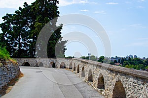 Road to Pula Castle also called Kastel or Fortress Kastel with the stone wall, in Pula, Croatia