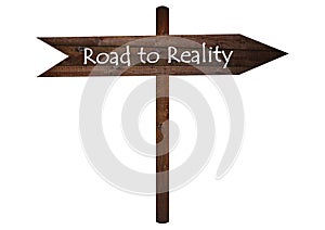 Road to reality sign on a wooden board.