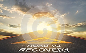 Road to recovery for business and health concept with golden sky background