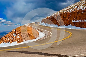 The road to the snow-covered mountain Pikes Peak, Colorado, US