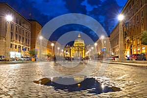 Road to the St. Peter& x27;s Square and Basilica in Vatican City at dusk