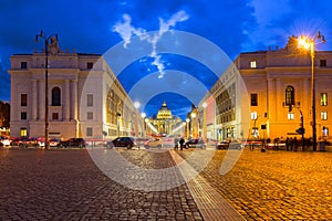 Road to the St. Peter& x27;s Square and Basilica in Vatican City at dusk