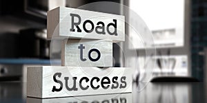 Road to success - words on wooden blocks