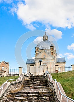 The road to the temple. Catholic church of the Holy Trinity. Liskiava