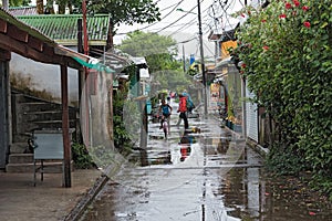 Road in tortuguero village at rainy weather, Costa Rica